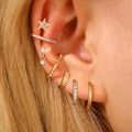 7-piece 14K gold plated earring set featuring star and butterfly studs with cubic zirconia - Gold Multi-Pattern Rhinestone Set (10487)
