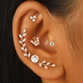 14K gold leaf and flower stud earring set with pave zircon stones on ear - Gold Jungle Leaf Style (2581)