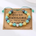 Bracelet perlé fait main avec perles turquoise et jaunes et breloque cœur en argent - 18 Blanc K (K-015)