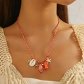 Collana bohémien a tema marino con stelle marine conchiglie e ciondoli a pesce - Collana / Rosso 8280