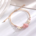 Handmade ocean style woven starfish bracelet with pink ceramic conch on beige cord - Pink