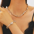 Elegante unregelmäßige silberne CCB-Herzanhänger-Halskette und Armband-Schmuckset für Damen - Silber Lava Stil Halskette Armband Set
