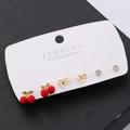 Three-pair set of red cherry, golden bow, and crystal stud earrings on display card - KC Gold (WG-0094)