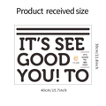 Dettaglio dell'adesivo murale It's Good To See You dimensioni 40cm x 30cm in PVC nero opaco - 30*40cm