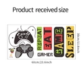 Macro view of game controller wall stickers with Eat Sleep Game Repeat slogan 30x60cm - 30x60cm