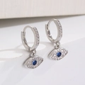 Detailed close-up of evil eye hoop earrings with blue stones and cubic zirconia - 02 White K Style (1663)