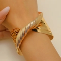 Detail of twisted gold bangle featuring matte center and polished metallic layers - Multi-Layer Matte Twisted Bracelet (A-1280) / Gold