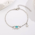 Pulsera de cangrejo plateada con cristal azul cielo central y colgante de estrella pulida - Pulsera de Cangrejo (5710) / Plata Brillante
