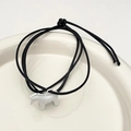 Minimalistisches schwarzes Webarmband mit weißem Pony-Anhänger für Damen - Weiß Geflochtener Seilstil