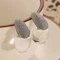 Close-up of teardrop earrings with silver metal pavé rhinestones and clear resin pendants - Zirconia Inlaid Water Drop (A-577) / White K (Inlaid Zirconia Style)