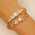 Golden charm bracelet with LOVE lettering and heart flower pearl pendants for women - Gold