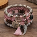 Boheems gelaagd kralenarmbandenset met roze kwastjes en een zilveren veren hanger - Roze Wit Zwarte Stip Veer Kwastje (M-544)