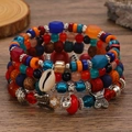 Boheems gelaagd kralenarmbandsset met schelp-, hart- en vlinderbedeltjes - Regenboog Schelp Vlinder Hart (5054)