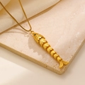 Gold fish bone pendant necklace with articulated segments and green eye detail - Segmented Fishbone Style (X-230) / 18k Gold Plated