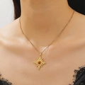 Collar de acero dorado con colgante de sol octogonal y piedra de ojo de tigre marrón - Estilo Estrella de Sol (8467)