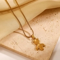 Elegant gold fish pendant on a snake chain necklace displayed on a silk surface - 18K Gold