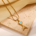 Golden fish tail necklace with blue evil eye pendant on elegant silk background - 18K Gold