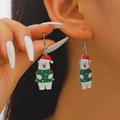 Christmas polar bear earrings with white acrylic pendants and festive green sweaters - Polar Bear Style (2536)