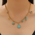 Collana bohémien dorata con ciondoli occhio di Allah blu e pendente a cuore turchese - Combinazione Malocchio (03) / Oro
