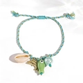 Handwoven blue-green starfish bracelet with shell and golden dolphin charms - Green