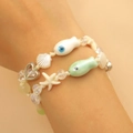 Marine theme beaded bracelet set with starfish and seashell charms in soft green and white - Bracelet Set
