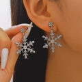 Elegant silver snowflake earrings featuring sparkling rhinestones and a star-shaped stud - 08 White K Style (S106)