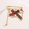 Detail of Christmas brooch with red-green ribbon bow and Santa enamel pendant charm - Santa Bow Chain Style (7508)