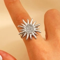 Detailed shot of silver sunflower ring featuring sparkling crystals and adjustable band - Steel Silver (S21)
