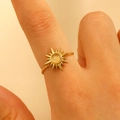 18k gold plated sunburst open ring featuring a translucent moonstone center on a model hand - 18k Gold Plated (3155)