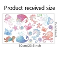 Detailed dimensions of cartoon marine animal wall decals featuring whales and jellyfish - 35*60cm