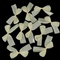 Detailed view of ten handmade pleated sheer ribbon bows in cream for DIY craft accessories - Approx 4x5.5cm / Yellow