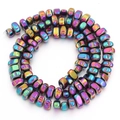Macro shot of colorful iridescent hematite drum beads for DIY jewelry making - Approx 5x8mm size, approx 1.2mm hole (approx 90 beads) / Multicolor