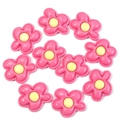 Detailed flat lay of pink resin flower charms with yellow center for DIY crafts - Size Approx 30x36mm / Rose Red
