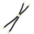 Close-up of black braided rope bracelet with gold-plated tree of life metal charm - Gold Buckle / Black
