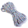 Detail of blue speckled knit yarn cord with multi-color dots for DIY accessories - Diameter approx 10mm / Light Blue