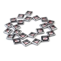 Macro detail of dark grey hematite square spacer beads strung on a red cord - Diagonal Ring / 11x11mm (Approx. 38 Pcs)