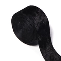Close-up of premium black velvet ribbon roll showing thick plush texture and soft sheen - 5 Yards/Roll / Black