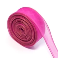 Close-up of rose red chiffon ribbon roll with elegant gold metallic wired edges - Rose Red