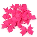 Makroaufnahme von rosenpinken Ripsband-Schleifen mit Rippstruktur und Schwalbenschwanz - Größe ca. 4,5X6cm / Fuchsia