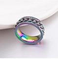 Detailed macro view of rainbow plated spinner ring with rotating Cuban link chain - US 5 / Colorful