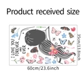 Detail of DIY wall sticker featuring butterflies and girl silhouette measuring 60cm by 35cm - 35*60cm