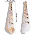 Macro detail of acrylic conch shell pendant with gold trim and 6.9cm height size guide - 69x17mm (6.5g)