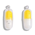 Cute yellow and white resin capsule charms with cartoon smiley faces for DIY jewelry - Yellow