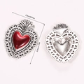 Macro detail of gothic silver heart pendant with red oil drip and measurement scale - Hollow Lace Sacred Heart (A5-159)