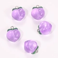 Detailed macro view of purple resin peach charms with sparkling glitter and silver ring - Transparent Purple