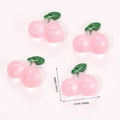 Macro view of 4 pink resin cherry charms with glitter and green leaves for DIY - Transparent Pink Cherry (A5-200)