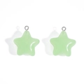 Detail of light green jelly star charms with silver rings for DIY jewelry and keychains - Green