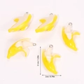 Macro shot of 3D resin banana pendant for DIY jewelry showing size 3.1cm by 2cm - Banana (A5-202)
