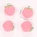 Detailed close-up of cute resin pink peach charms with green leaves for DIY jewelry making - Solid Pink Peach (A5-206)