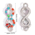 Macro detail of infinity connector with colorful resin beads and ladybug charm for DIY - Infinity Connector (A5-256)